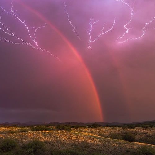 1st_Place_A_dying_storm_with_a_dazzling_double_rainbow_while_lightning_crawls_across_the_sky_last_week_near_Arivaca_AZ_by_Lor
