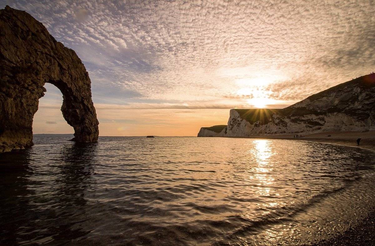 2nd Place Mackerel sky sunset from Durdle Door by Rachel Baker @Saintsmadmomma