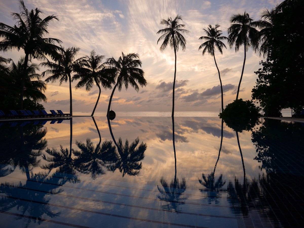 2nd Place Reflection in the infinity pool at Meeru Island, Maldives by Gill Prince @GillPrincePhoto