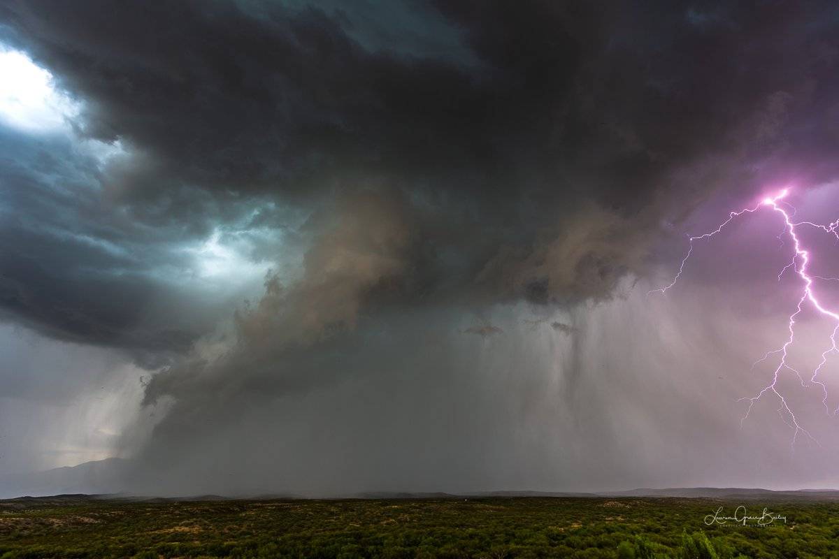 2nd Place Two storms collide and explode over the Rincon Mountains east of Tucson, Arizona by Lori Grace Bailey @lorigraceaz