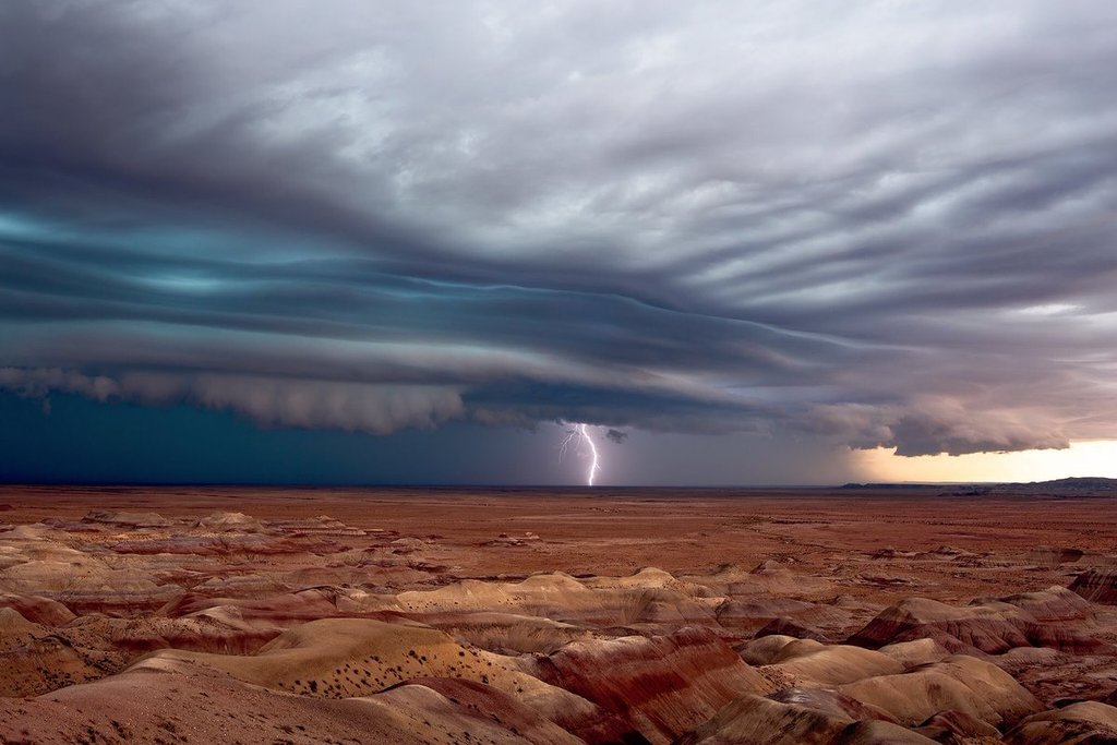 A_striated_shelf_cloud_leads_a_line_of_severe_thunderstorms_across_the_Painted_Desert_by_John_Sirlin_SirlinJohn_1024x1024
