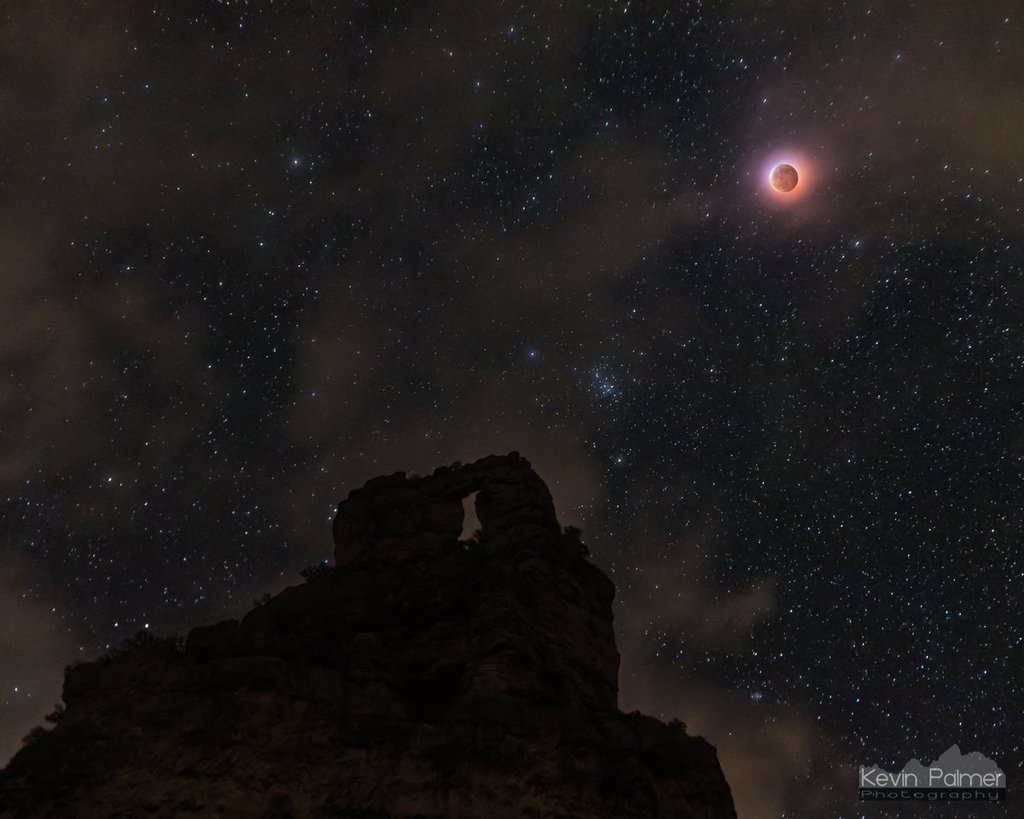 Supermoon_over_the_Needle_s_Eye_arch_near_Dayton_Wyoming_by_Kevin_Palmer_krp234_1024x1024