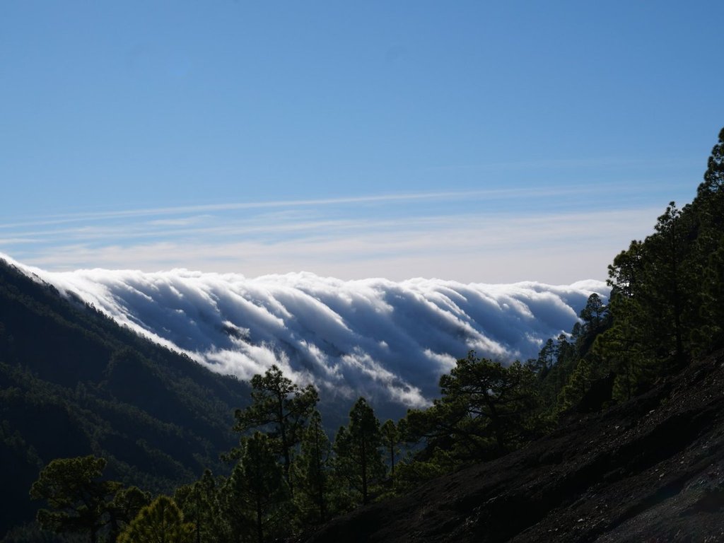 Cloud_rolling_in_over_mountain_ridge_in_Caldera_de_Taburiente_National_Park_by_Teresa_Jennings_treej9_1024x1024