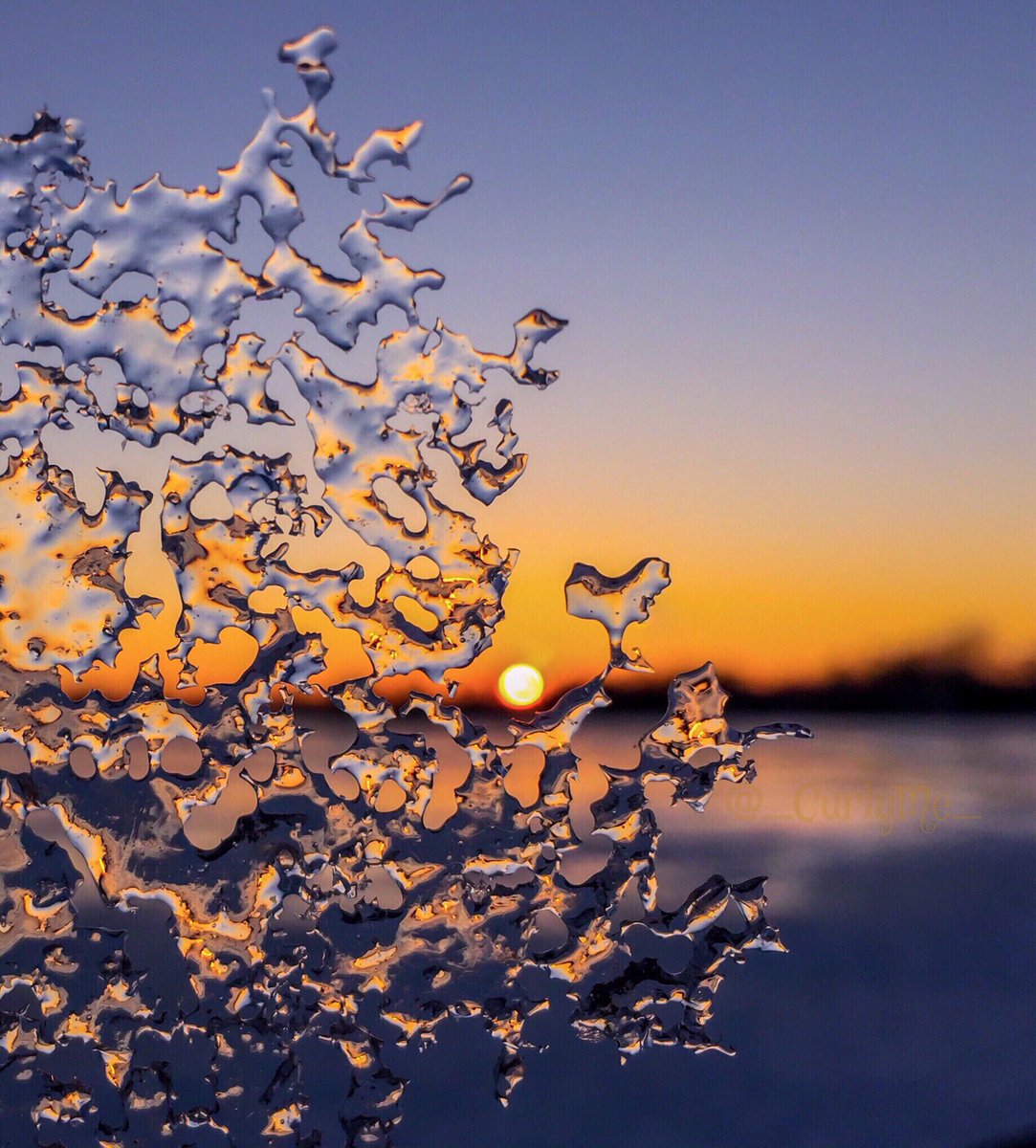 1st Place An icy sunset over the lake. Toronto, Canada by Foxxeh @_CurlyMe_