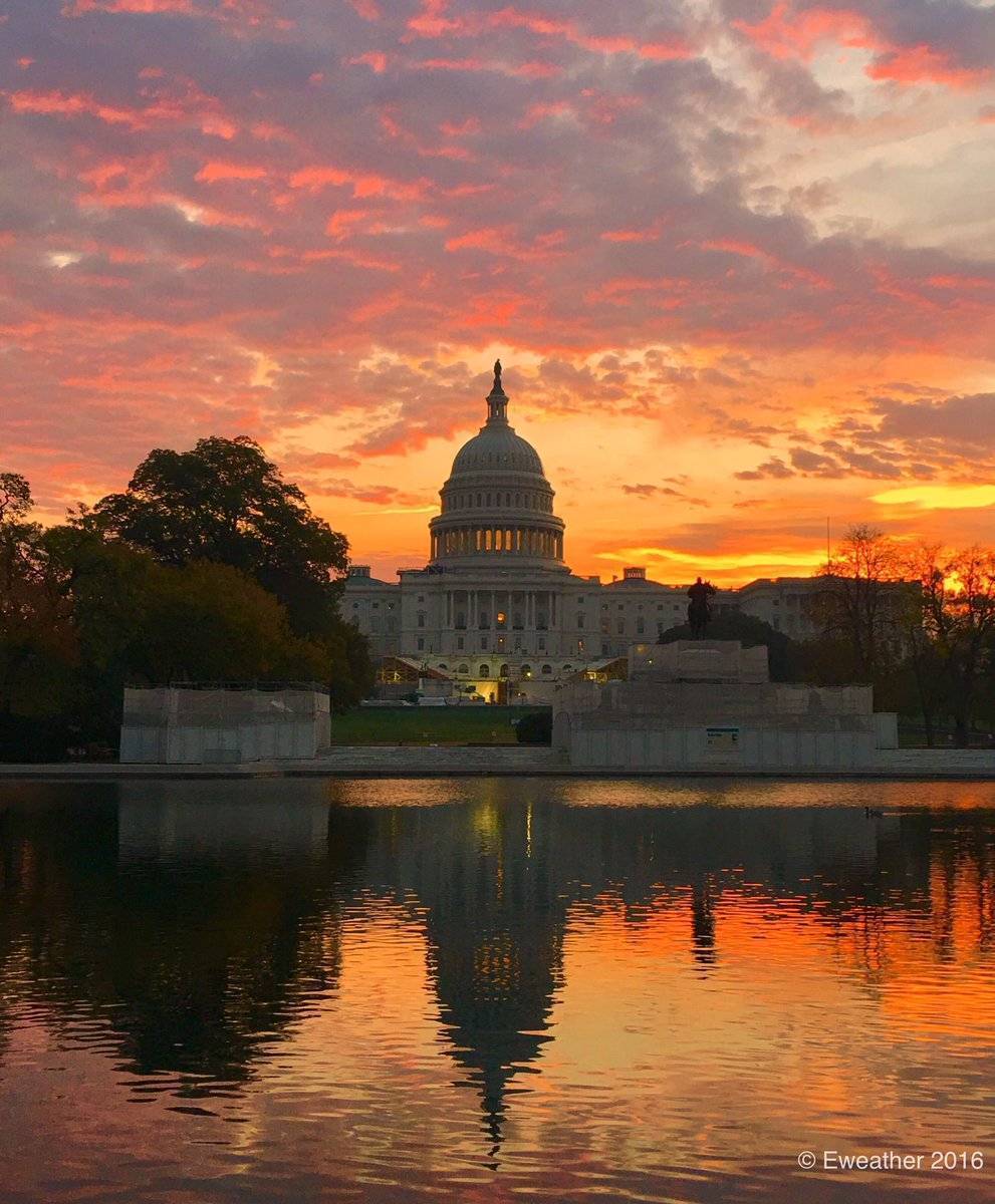 U.S. Capitol Washington DC sunrise over the reflecting pool on Thursday 