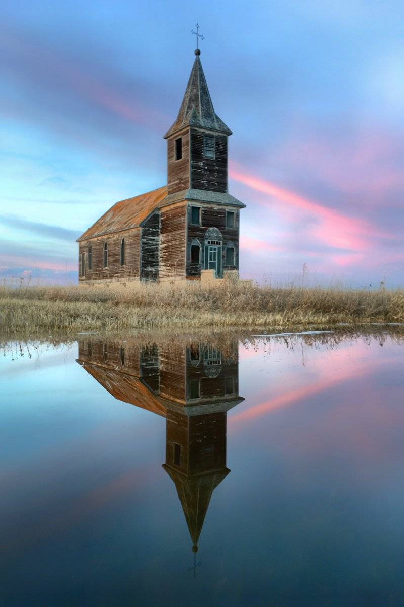 1st Place Jill @Photochic2013 When spring puddles and Saskatchewan sunsets collide... magic happens!