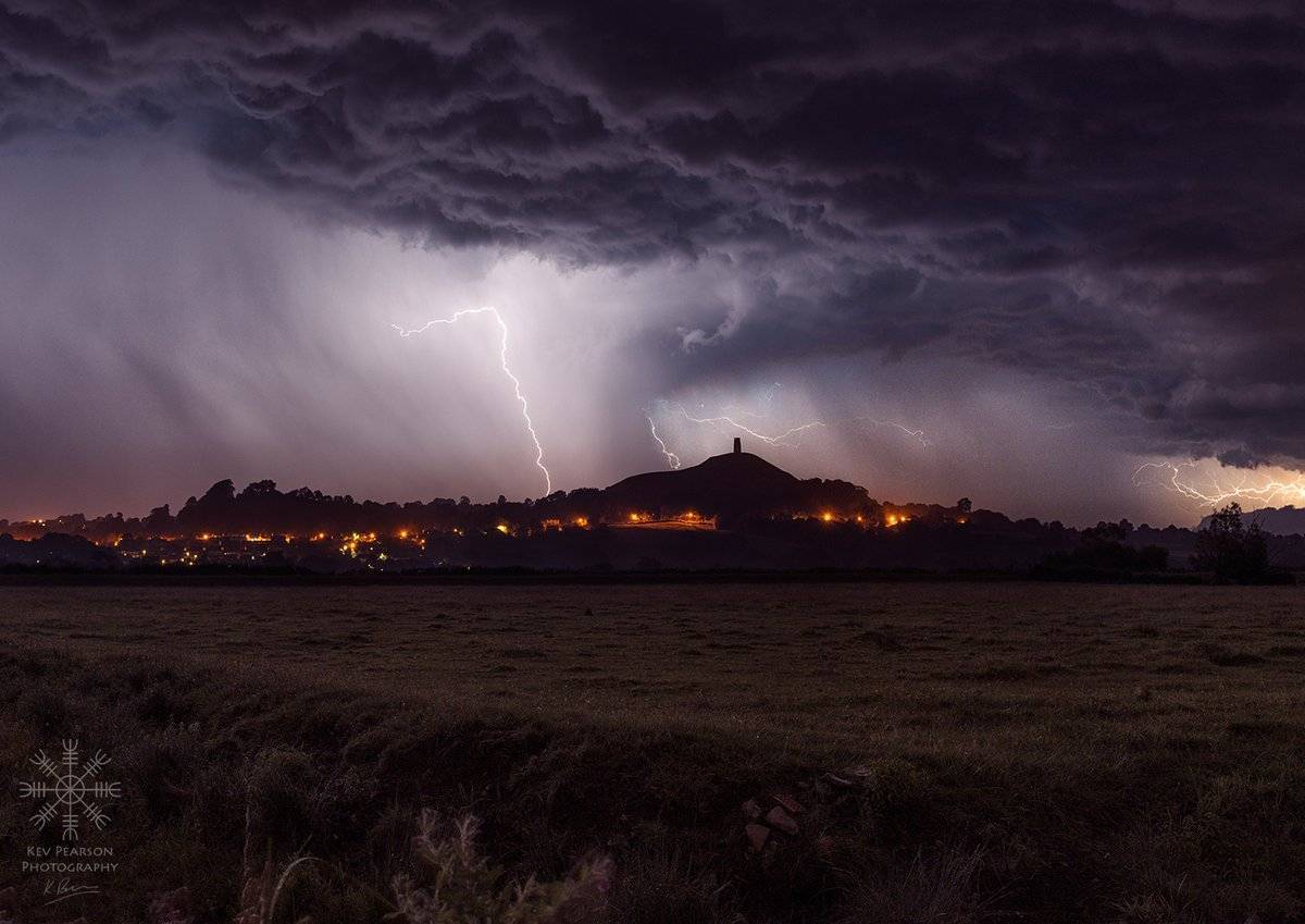 1st Place Kev Pearson @KevPearsonPhoto Thunderstorm passing over Glastonbury, UK last week. First attempt at this sort of thing & worth staying up for!