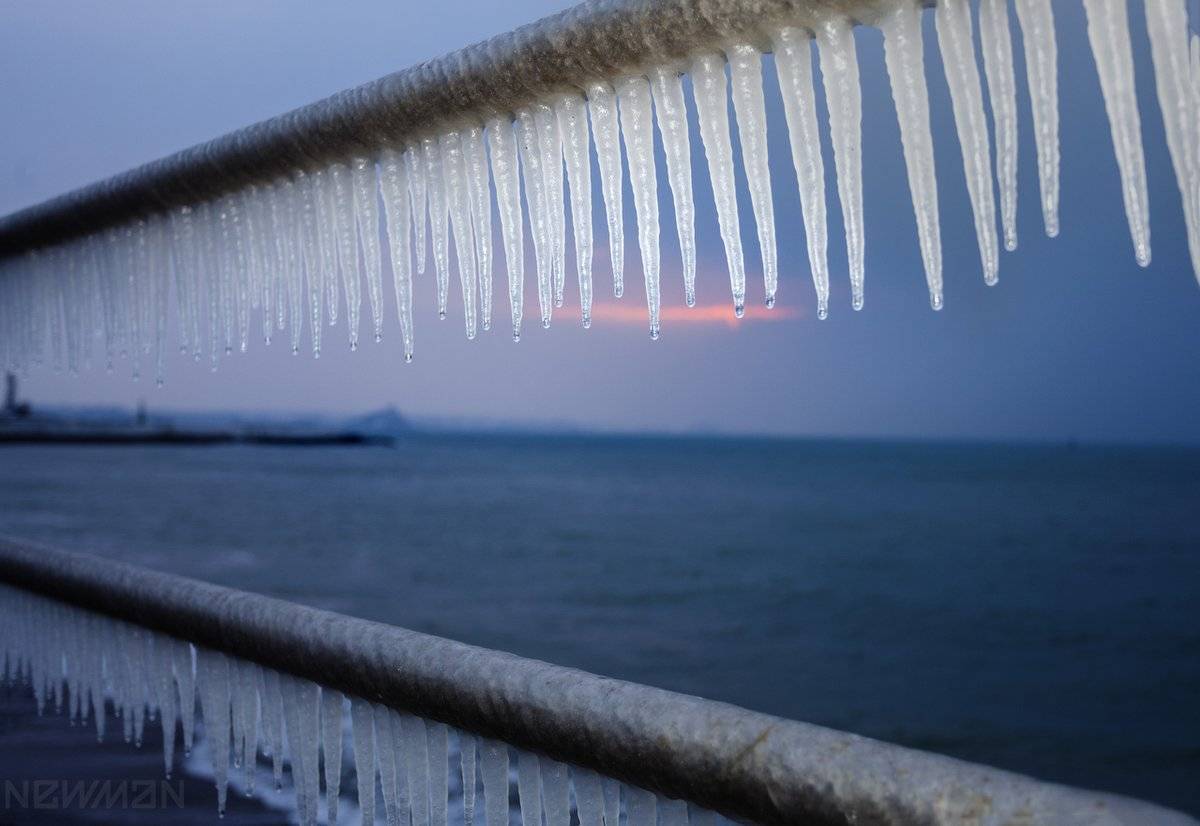 2nd Place Frozen seas water icicles on the promenade railings at Penzance by Mike Newman @ManOnaPlanet