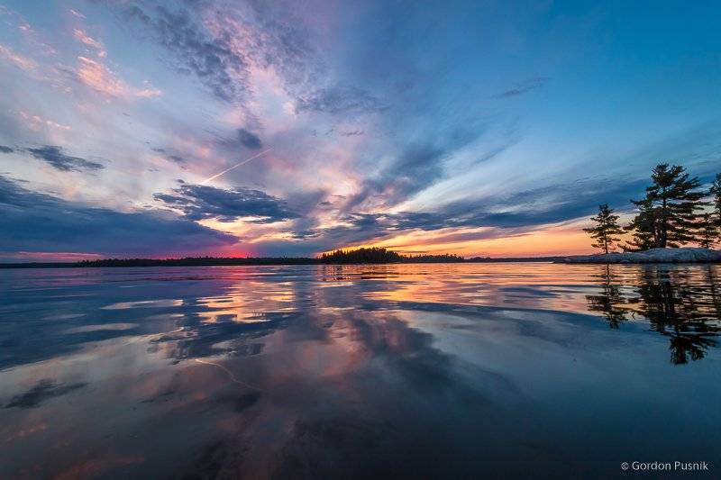 2nd Place Gordon Pusnik @gordonpusnik A colorful sunset and reflection which looked to me like a watercolor painting - N.W. Ontario, Canada.