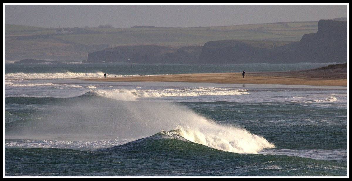 Strangers on the Shore. Portrush, Northern Ireland.