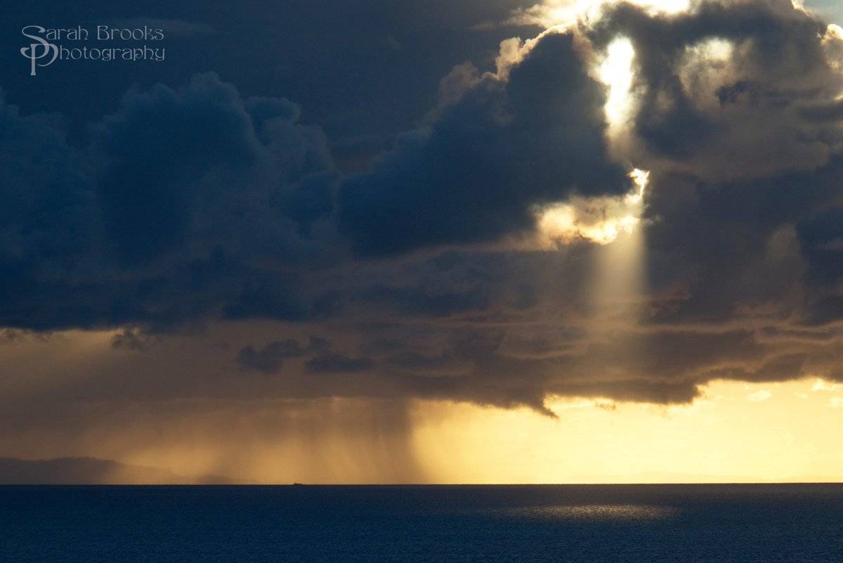 2nd Place Sarah Brooks Photos @SBrooksPhotosNZ Dramatic cloud burst at dusk offshore, Coromandel NZ