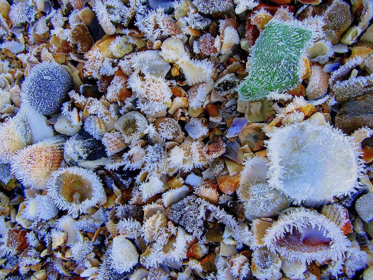 It's so cold there is frost on the beach in Hythe, Hampshire