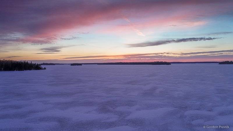 3rd Place Place Gordon Pusnik @gordonpusnik Icy Sunset, N.W. Ontario.