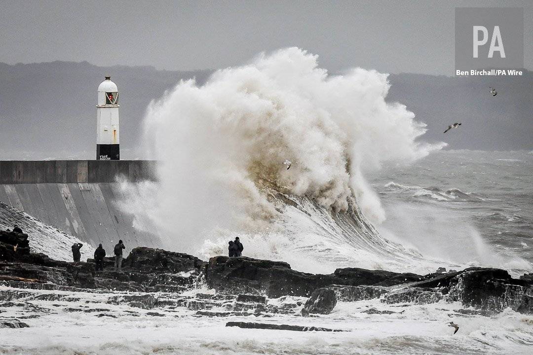 Huge waves dwarf spectators at Porthcawl, Wales by Ben Birchall @BenBirchallUK