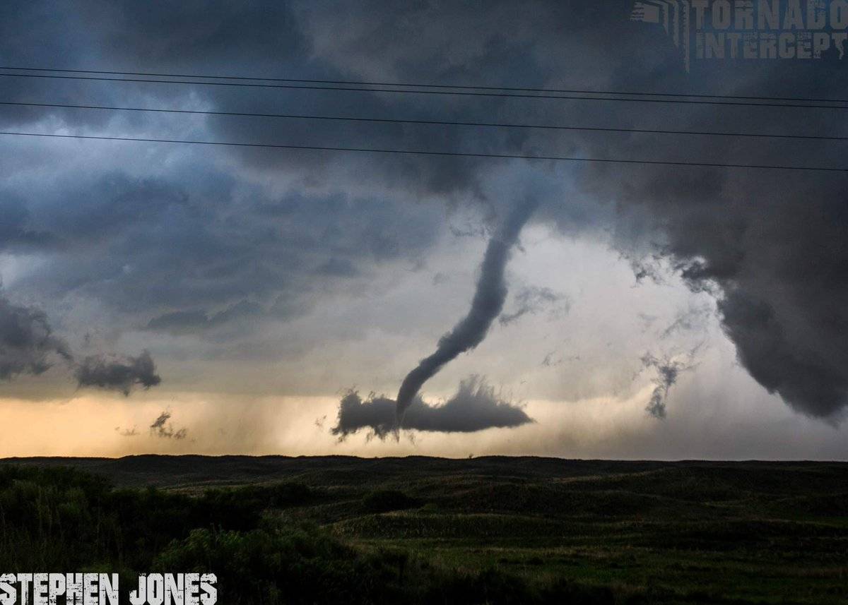 Like a snake slithering away, the Canadian, TX tornado begins it's rope-out stage into a very skinny snake like shape by Stephen Jones @Tornado_Steejo