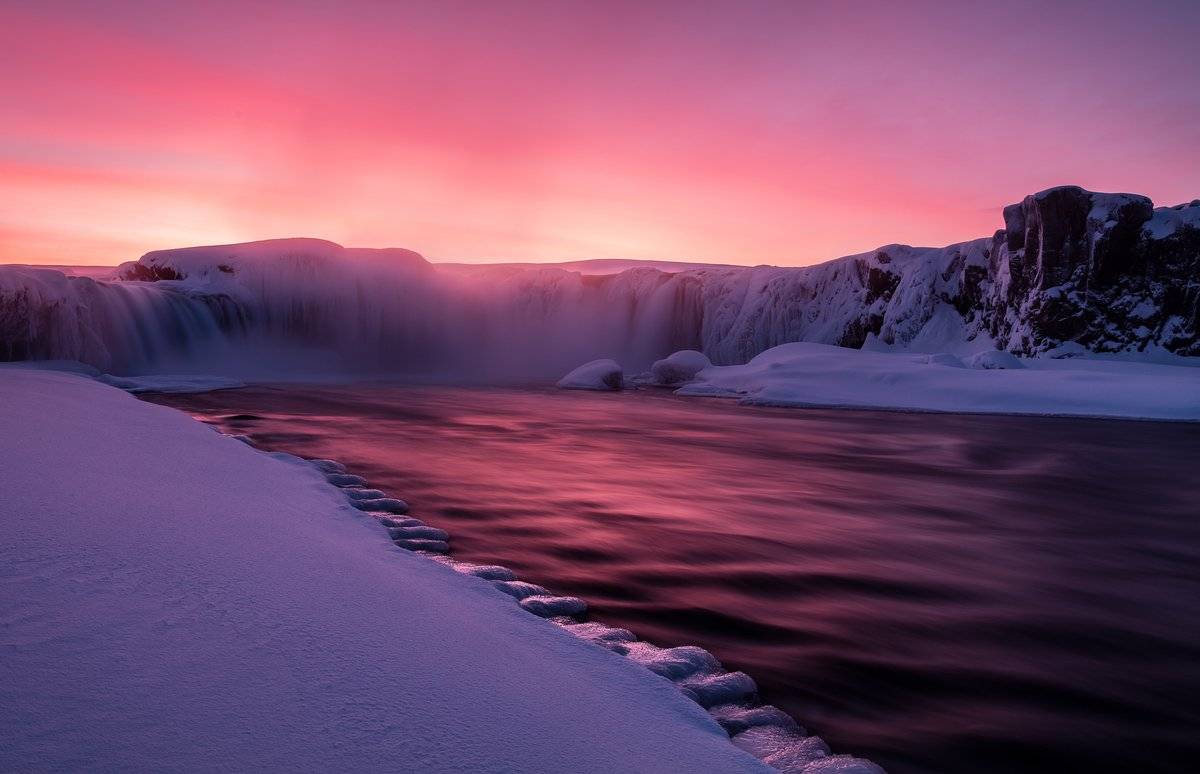 An intense, unforgettable sunset at Goðafoss – the waterfall of the gods by Serena Dzenis @serenavsworld