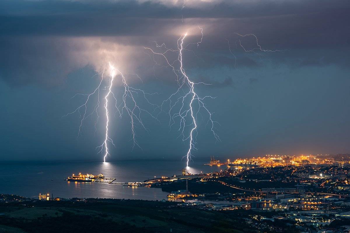Lightning over Trieste by Christophe Suarez @suarezphoto