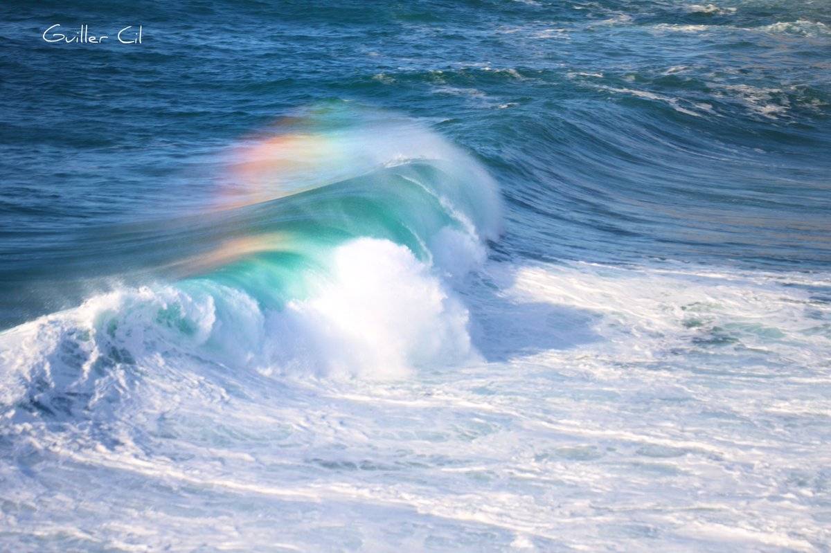Rainbow in the spray of the waves by Guiller @GuillerCil