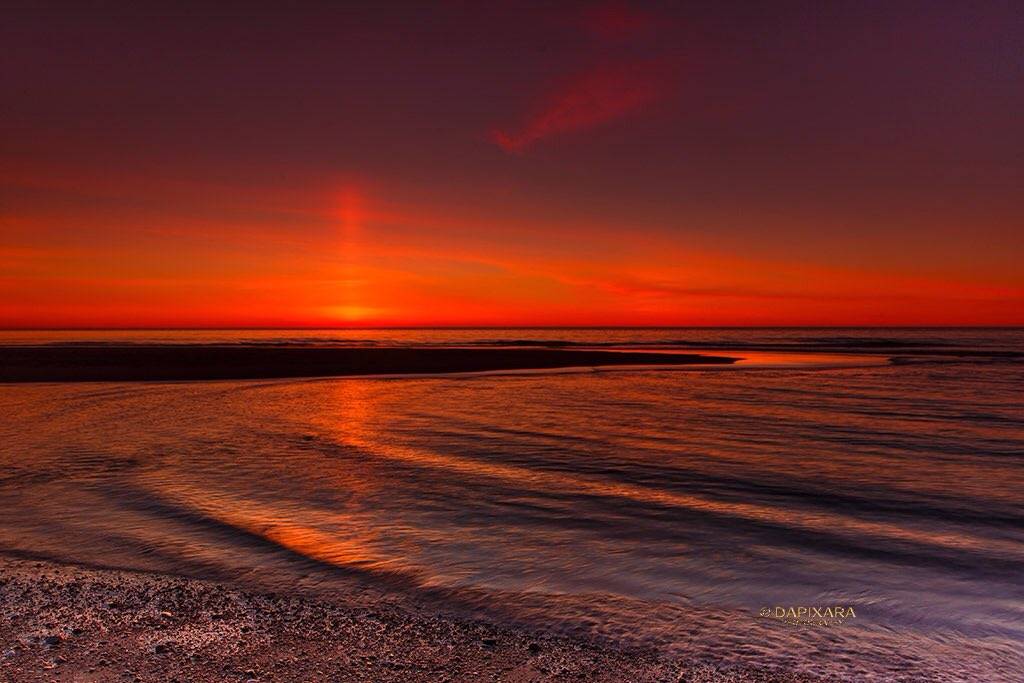 Spectacular sun pillar at Nauset beach Orleans, Cape Cod by DAPIXARA @dapixara