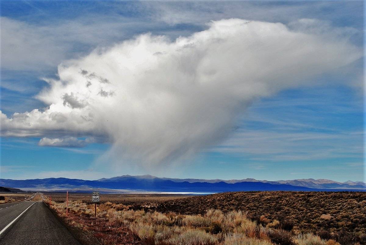 1st Place A little rain cloud popping up over Mono Lake, California, by Tom Greenough @TomGreenough