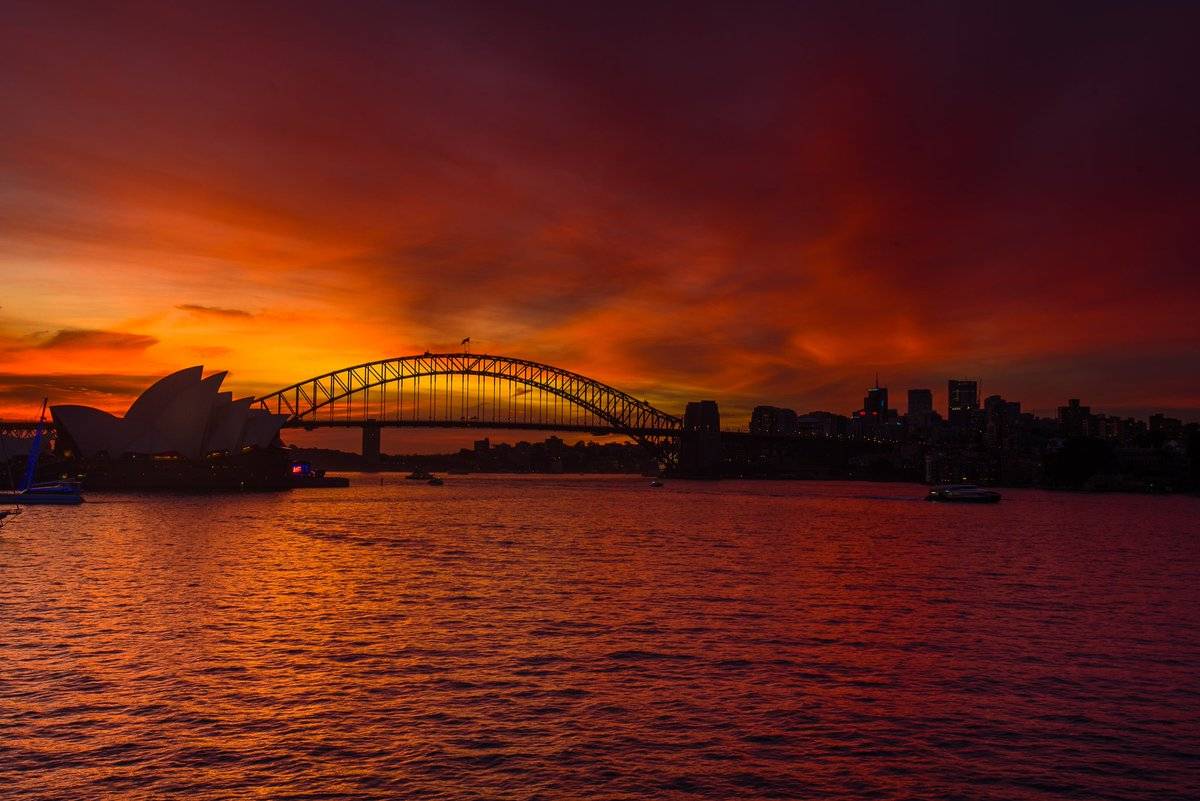Spectacular sunset overlooking Sydney Harbour Bridge and the Opera House by Glen Anderson @Gleno_