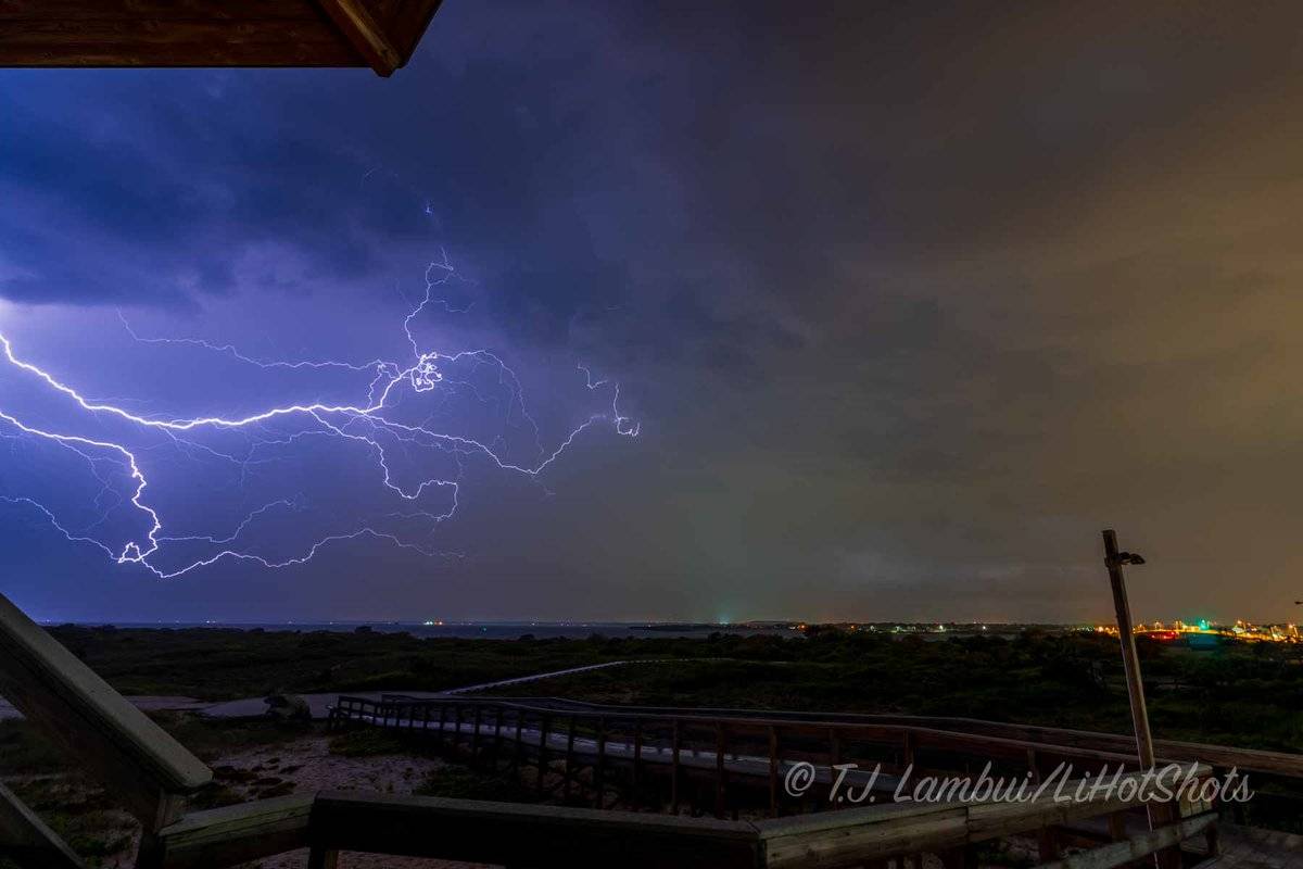 3rd Place Shirley, NY- Lightning as seen from Fire Island National Park on Long Island's south shore, looking north by LiHotShots @LiHotShots