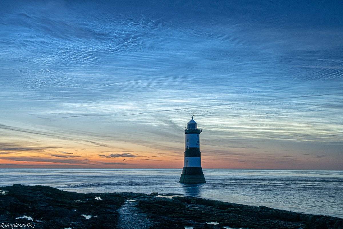 Stunning display of Noctilucent clouds over Trwyn Du, Anglesey by Phil Taylor @angleseyboy