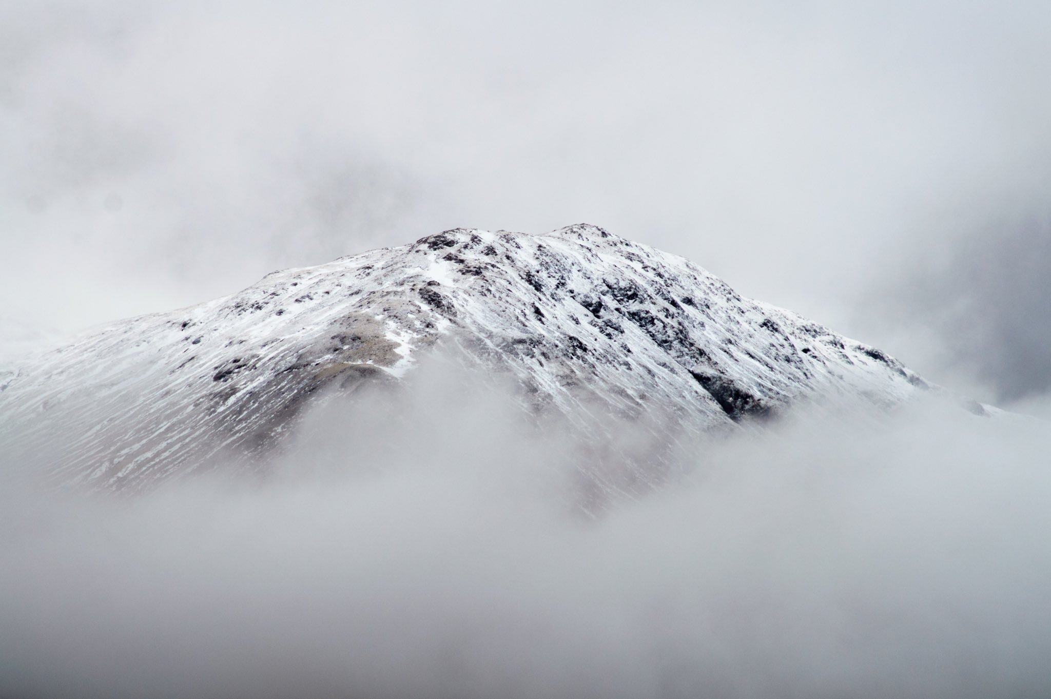 Emerging - The Scottish Highlands shrouded in mist. By Ryan Harris @ryanharrisphoto