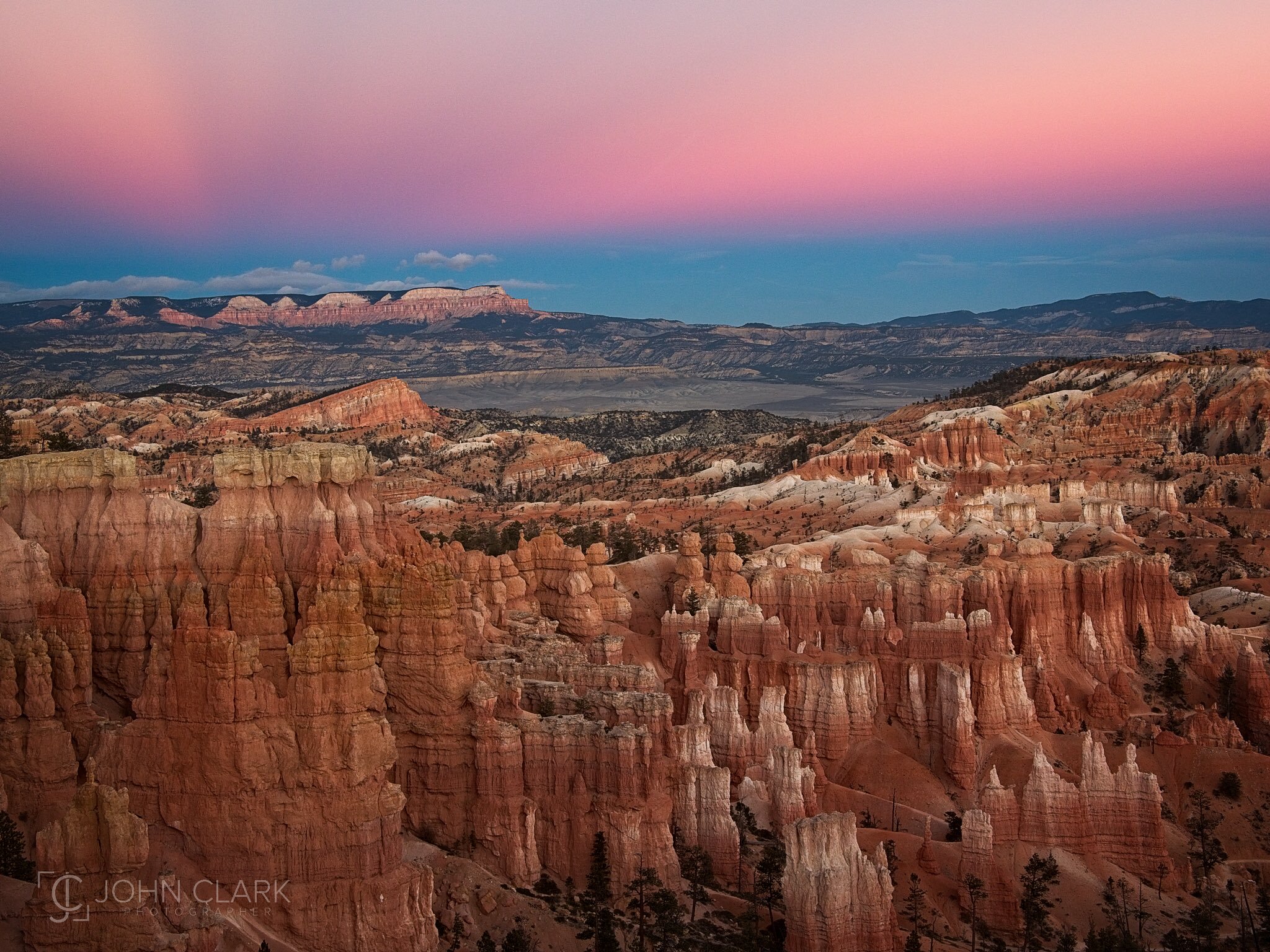 Hoodoos and sunset hues by John Clark | Photographer @GetRealJC