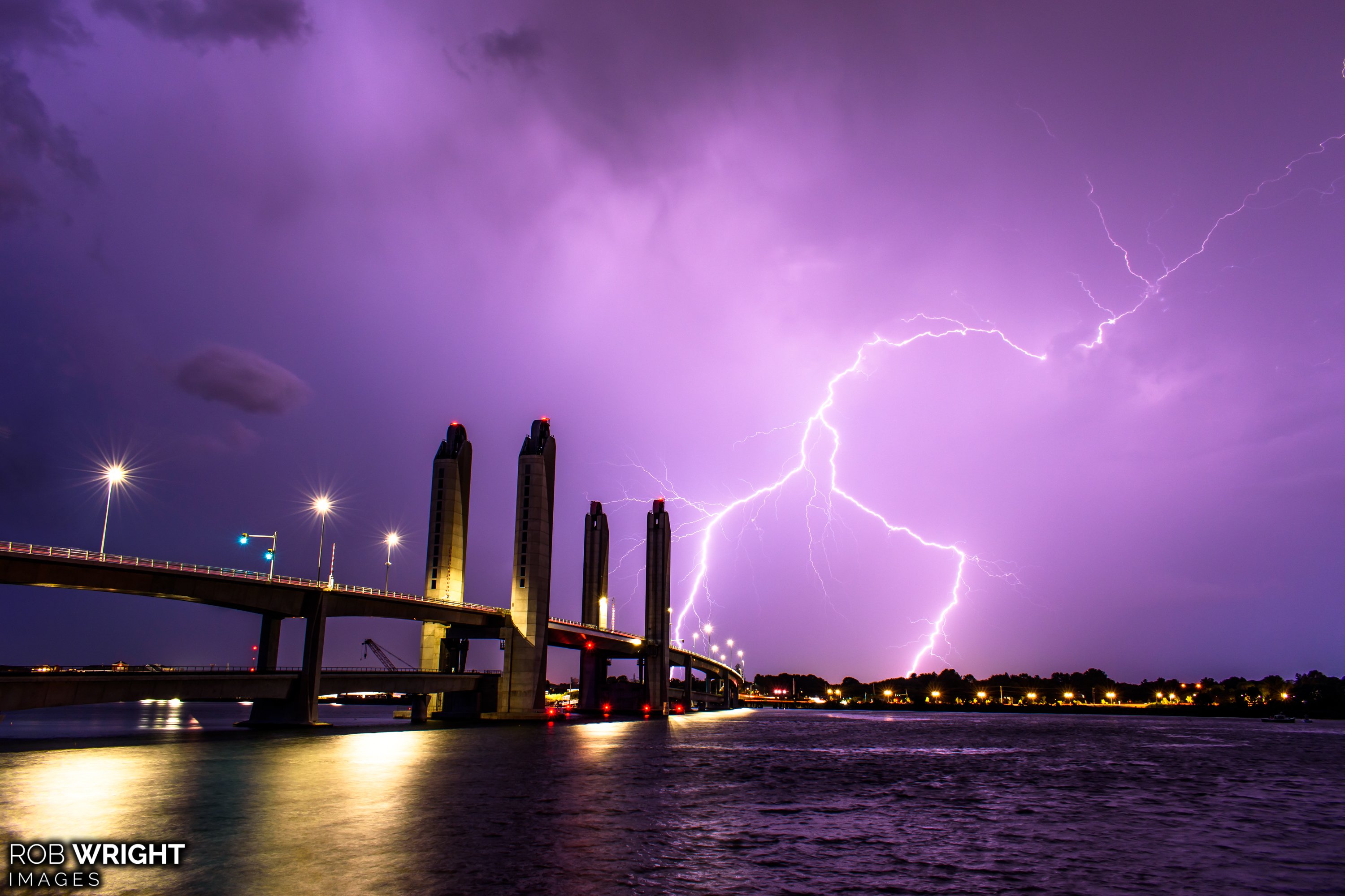 Lightning strikes behind the Sarah Mildred Long Bridge from Kittery, ME by Rob Wright Images @RobWrightImages