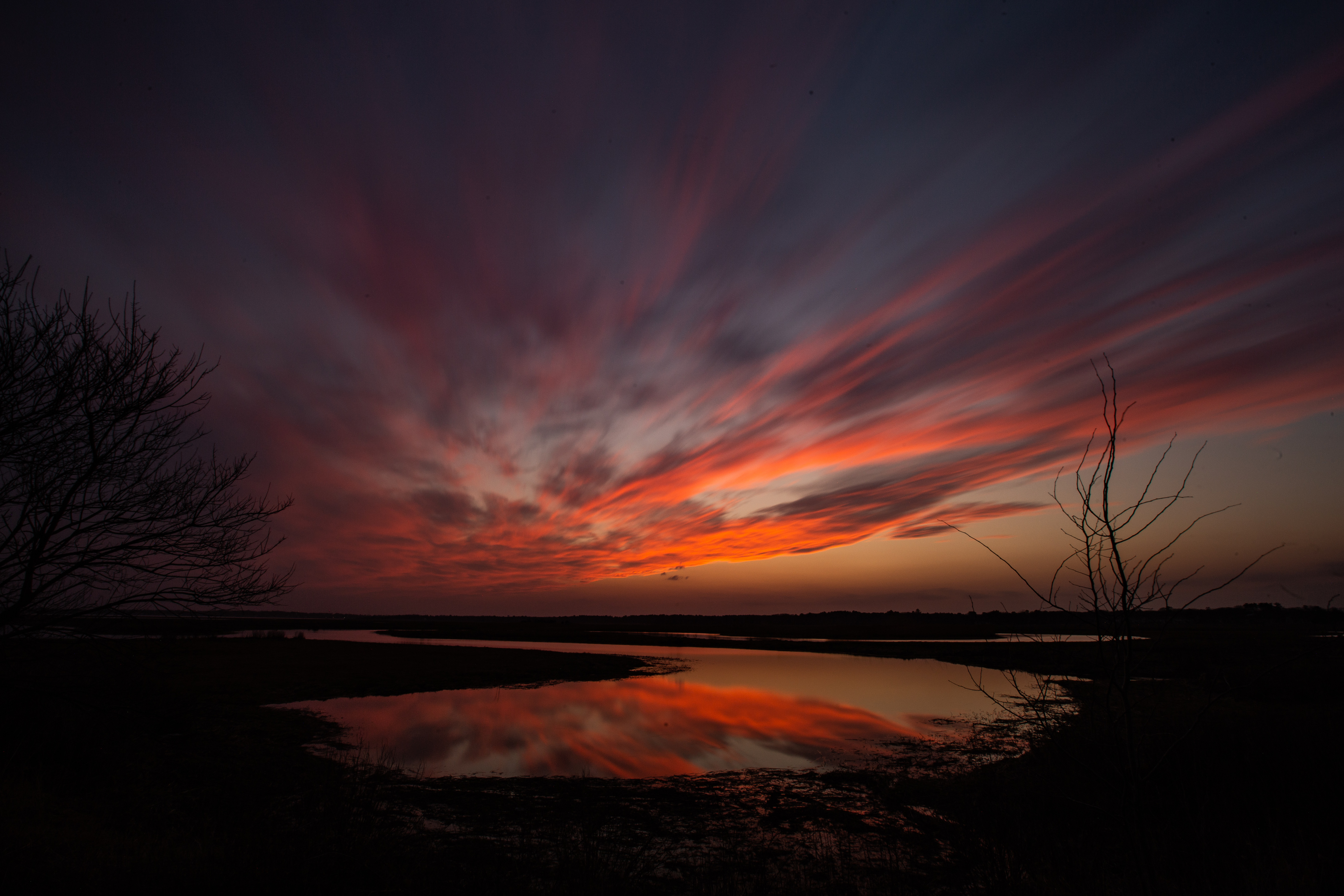 Sunset over the marsh by Chuck Martin