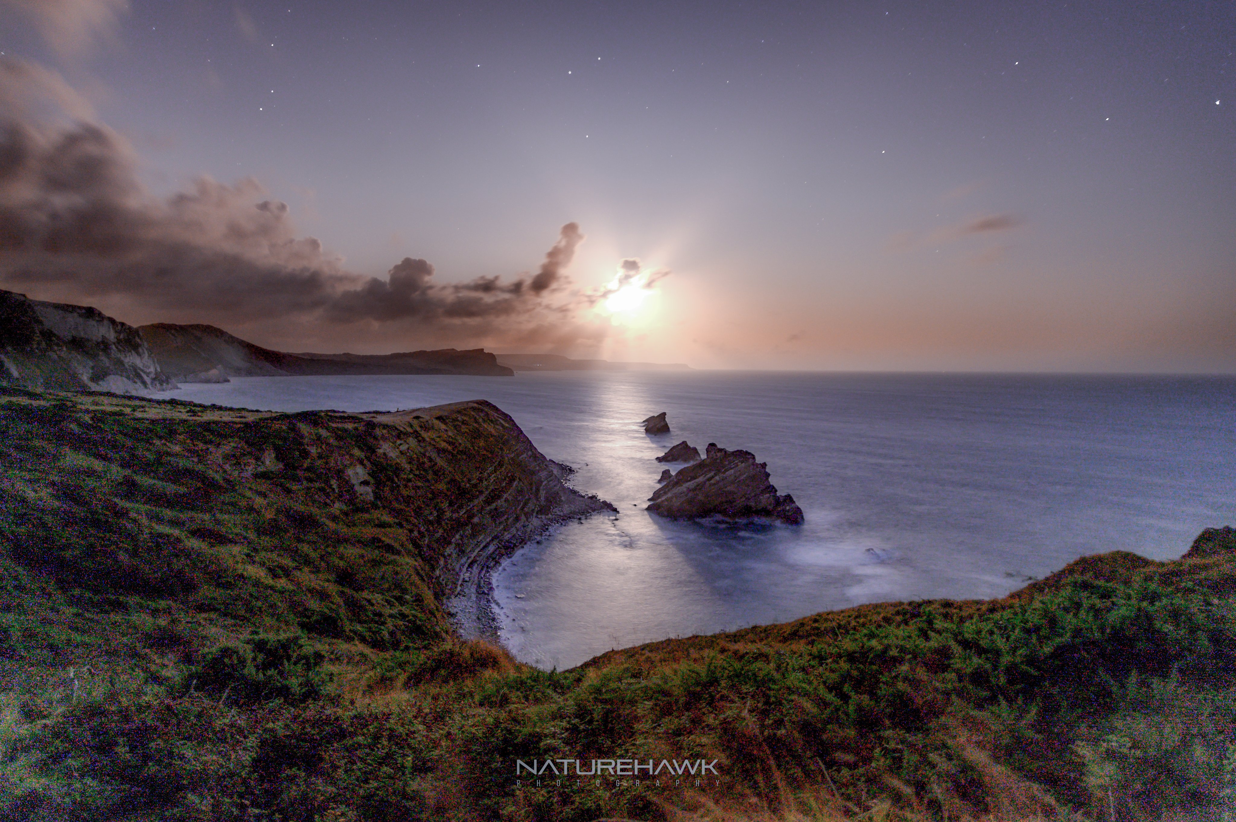Moon rise over Mupe Bay on Dorset's Jurassic Coast just before midnight by Naturehawk Photo @NaturehawkPhoto