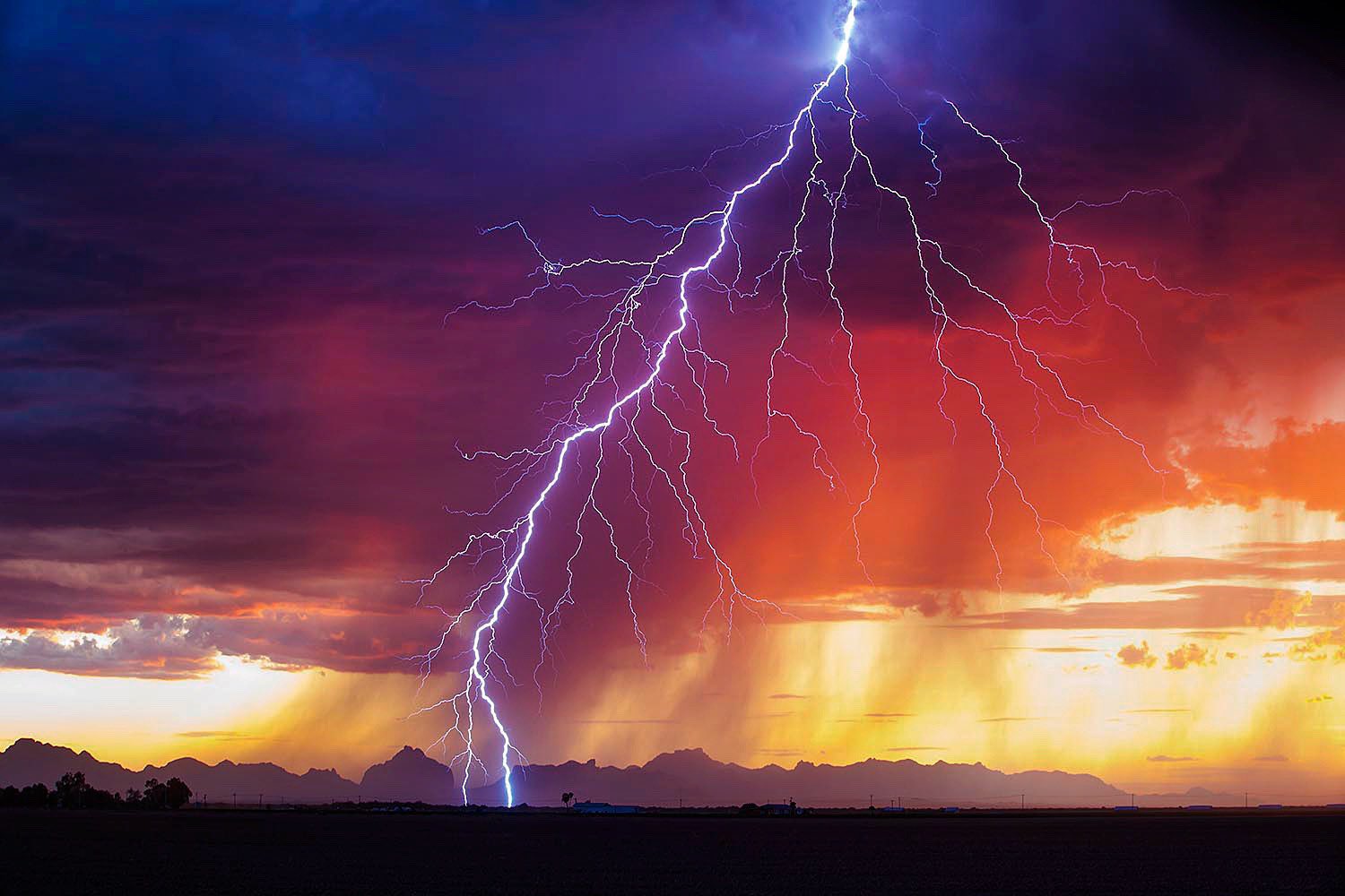 Beautiful veiny sunset lightning bolt strikes near Salome, AZ by Mark J. Rebilas @rebilasphoto