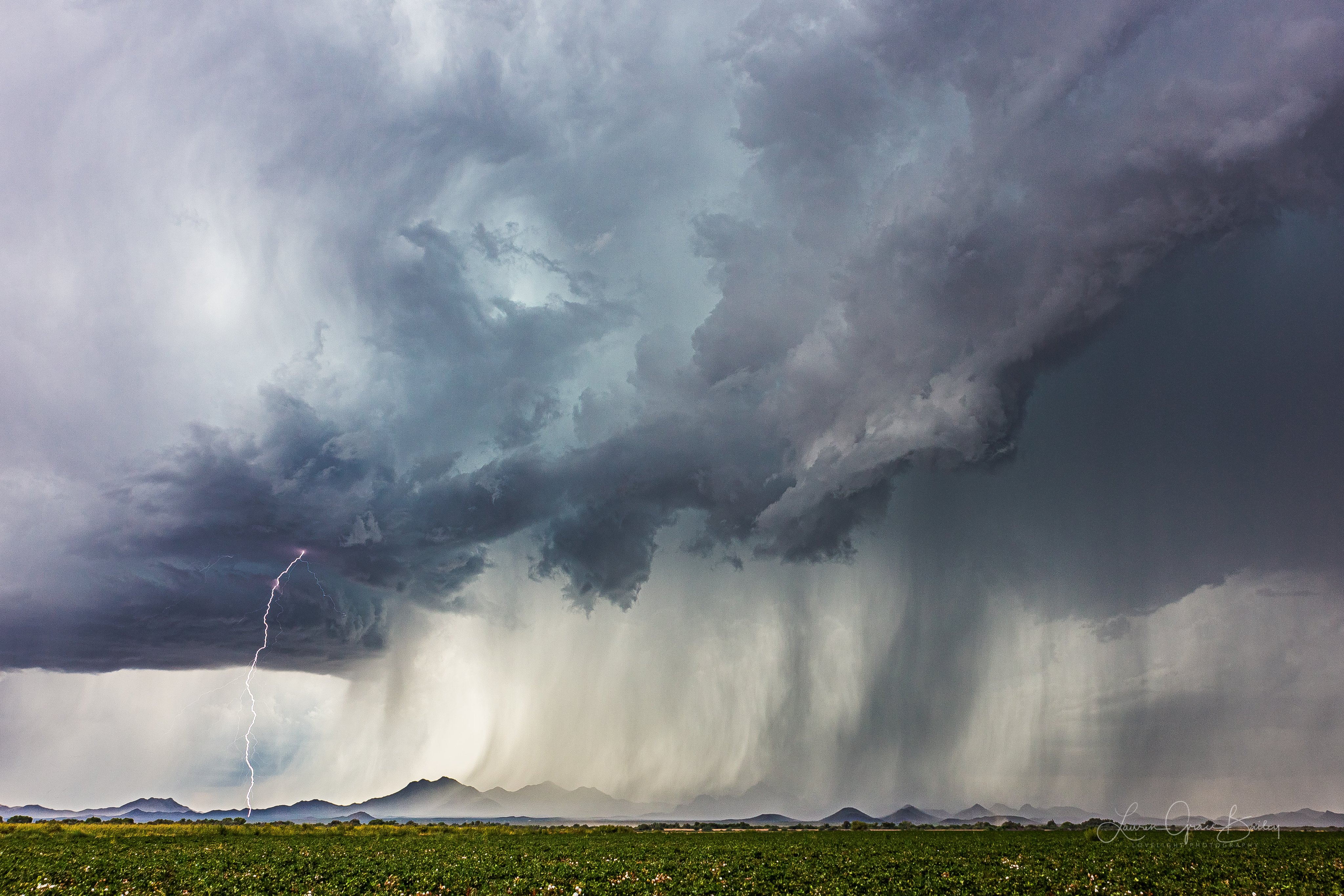 Rain storms over Ragged Top Peak in the Silverbell Mountains by Lori Grace Bailey @lorigraceaz