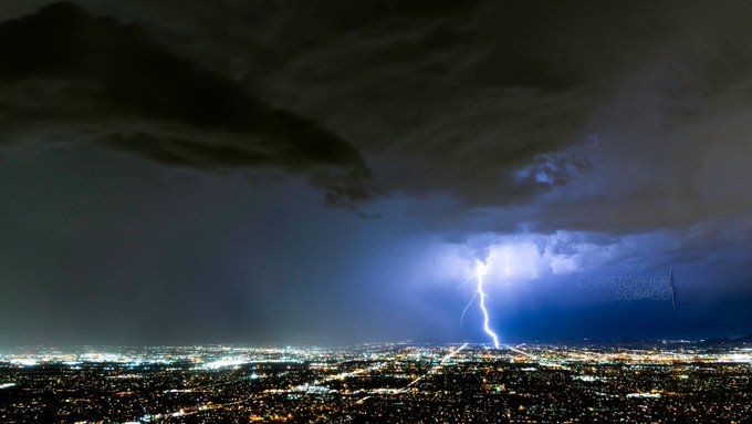 A storm sweeps across the Phoenix skyline by Christopher Scragg @monsoonchaser