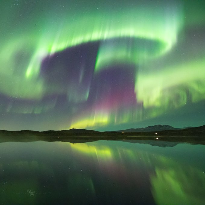 Aurora art on Storvannet lake on Senja, Norway by Adrien Mauduit @NightLights_AM