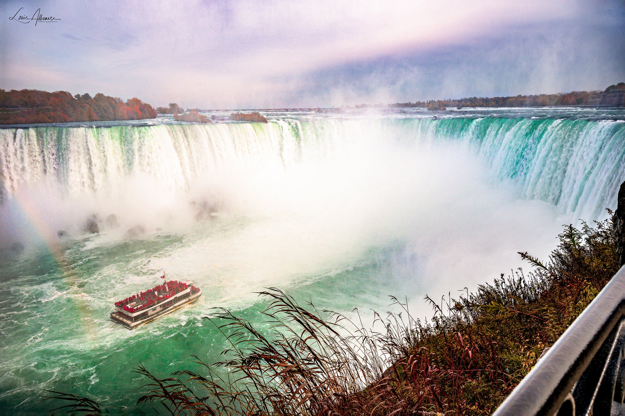 A rainbow appears behind the Hornblower at the Horseshoe Falls, Niagara Falls by Louis Albanese @DrLouisAlbanese