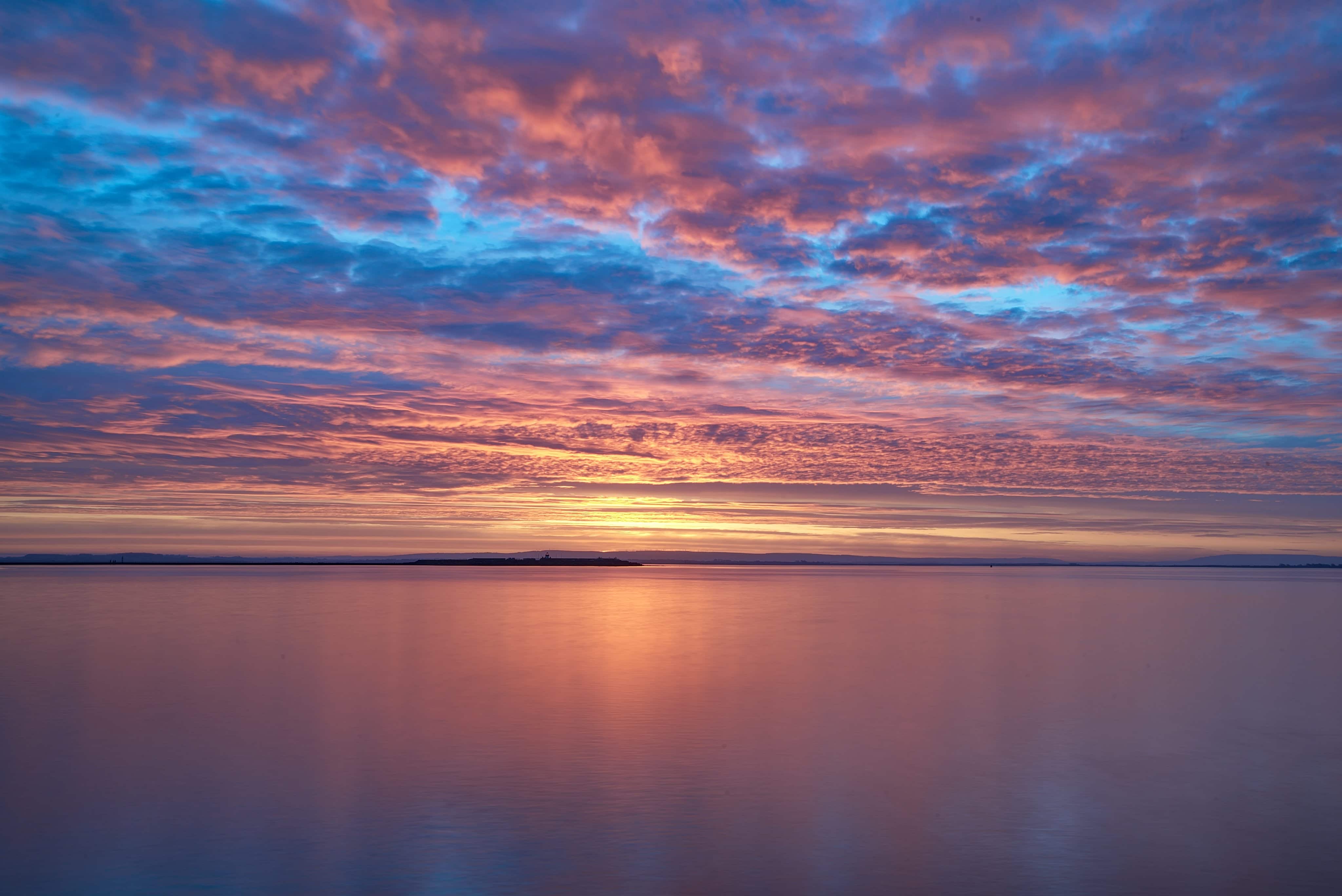 Colorful sunrise on Galway bay by WoodRoad Photography @woodroadphotos