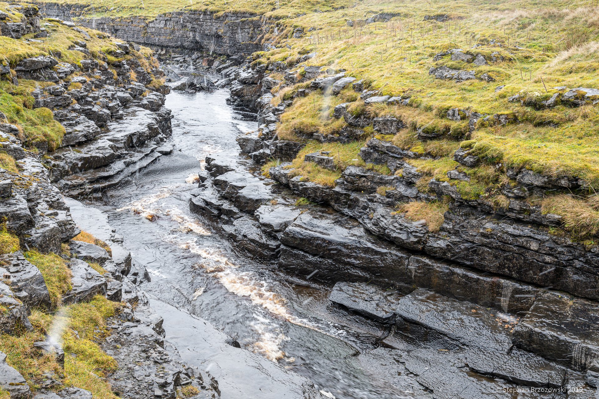 Sleety rain at Maize Beck Scar in the North Pennines by Stephan Brzozowski @stephanbrz