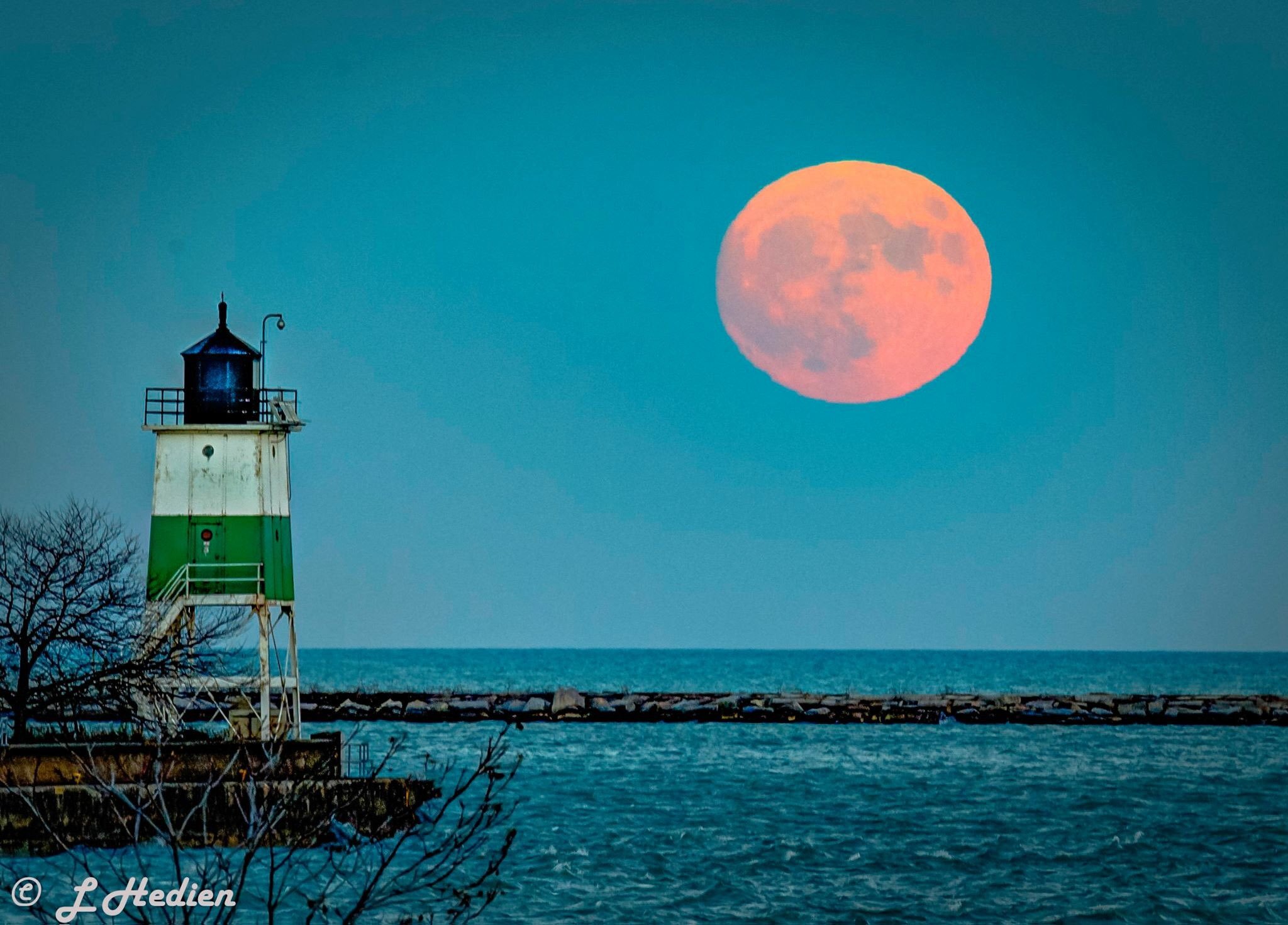 Sunset over Lake Michigan in Chicago IL by Laura Hedien- Storm Clouds Photography @lhedien