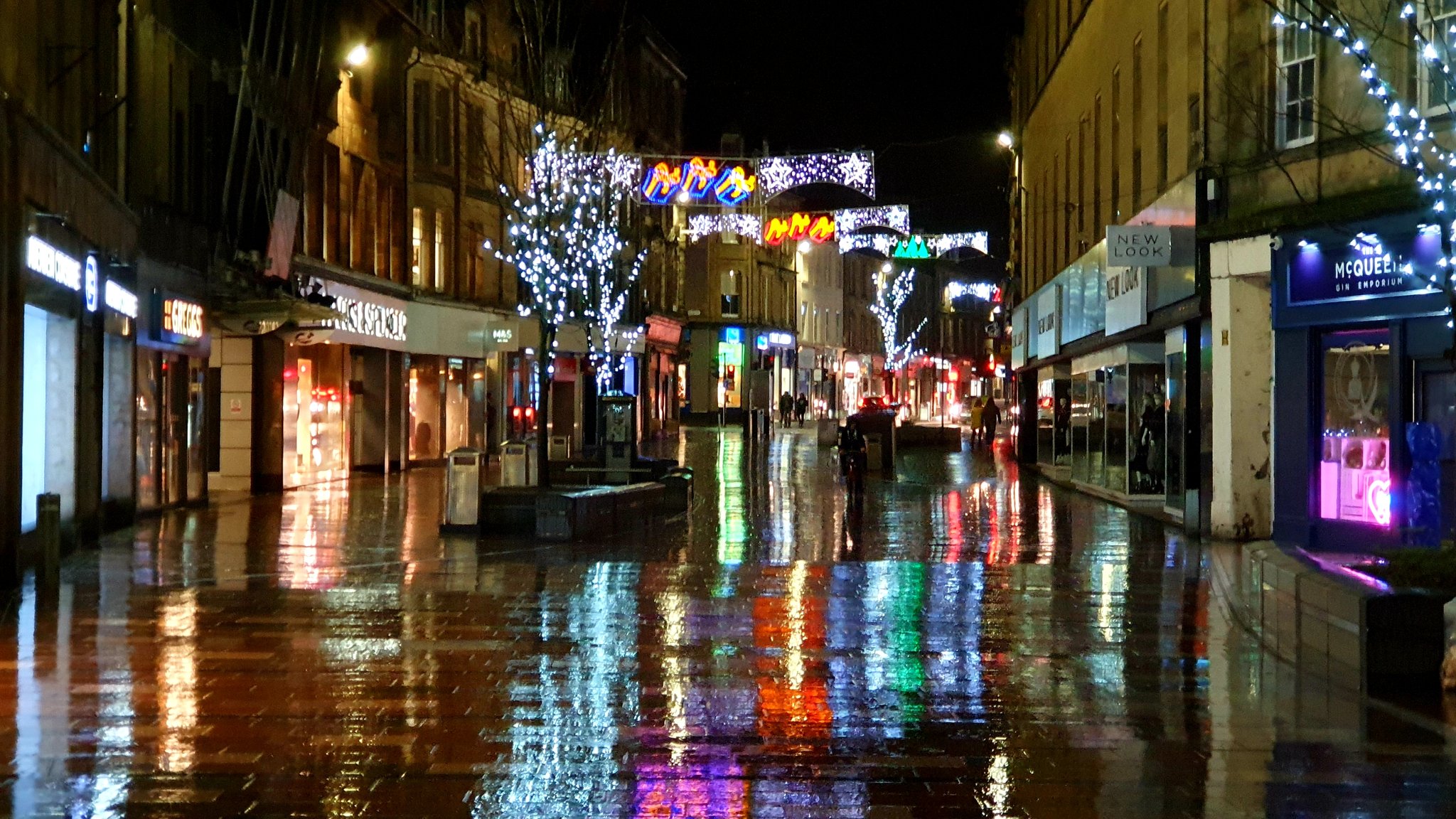3rd Place Festive colours reflected on the wet streets of Stirling, Scotland by Graham Fraser @frasergj