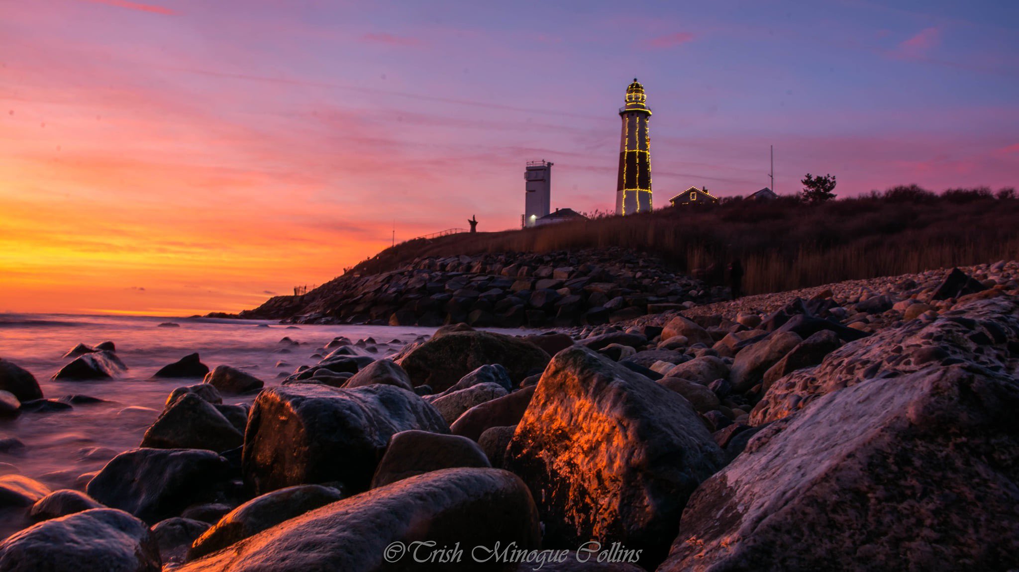 Montauk lighthouse in holiday lights by Trish MinogueCollins @TrishMinogPhoto