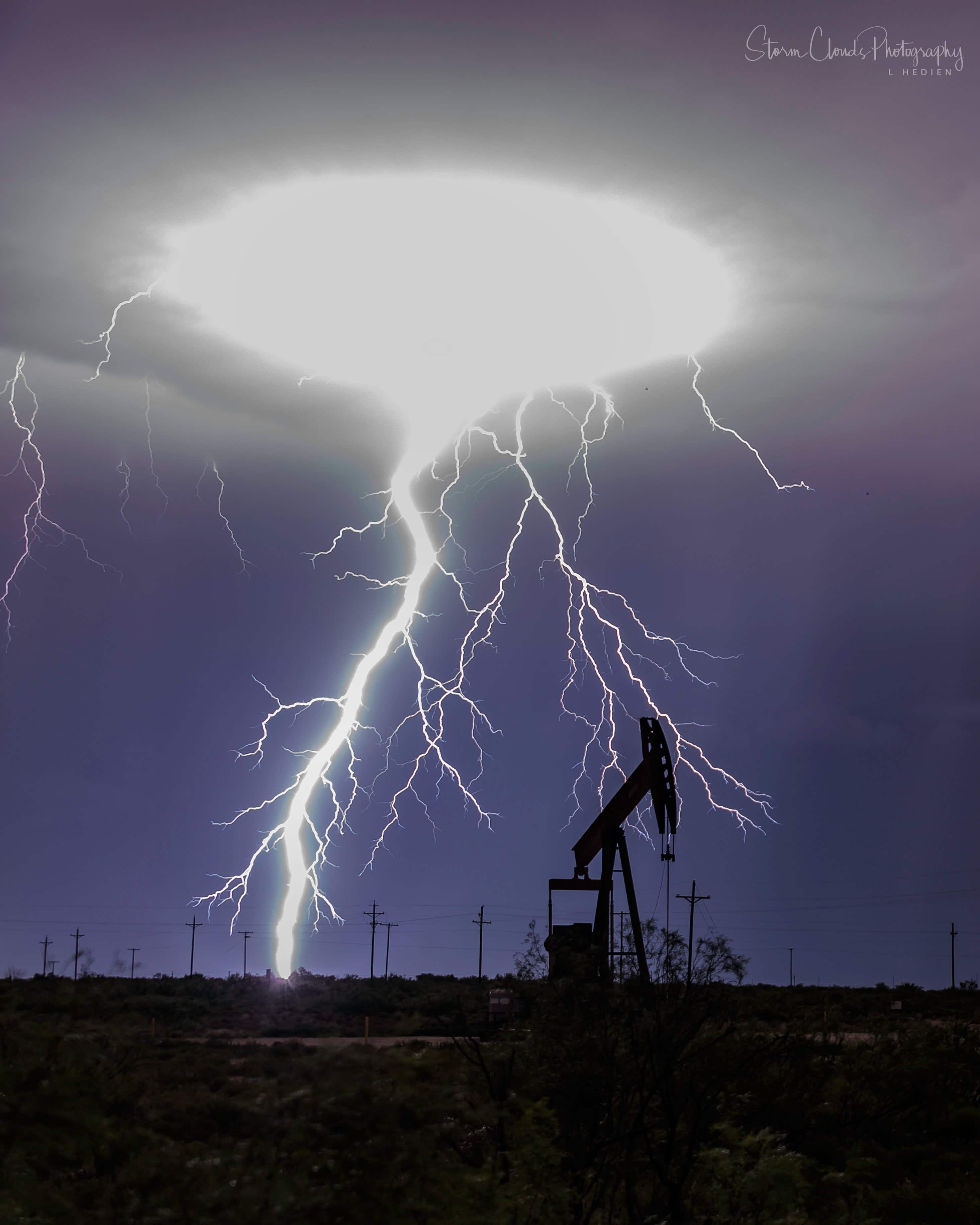 1st Place A multitude of bolts on the border of Texas and New Mexico by Laura Hedien- Storm Clouds Photography @lhedien