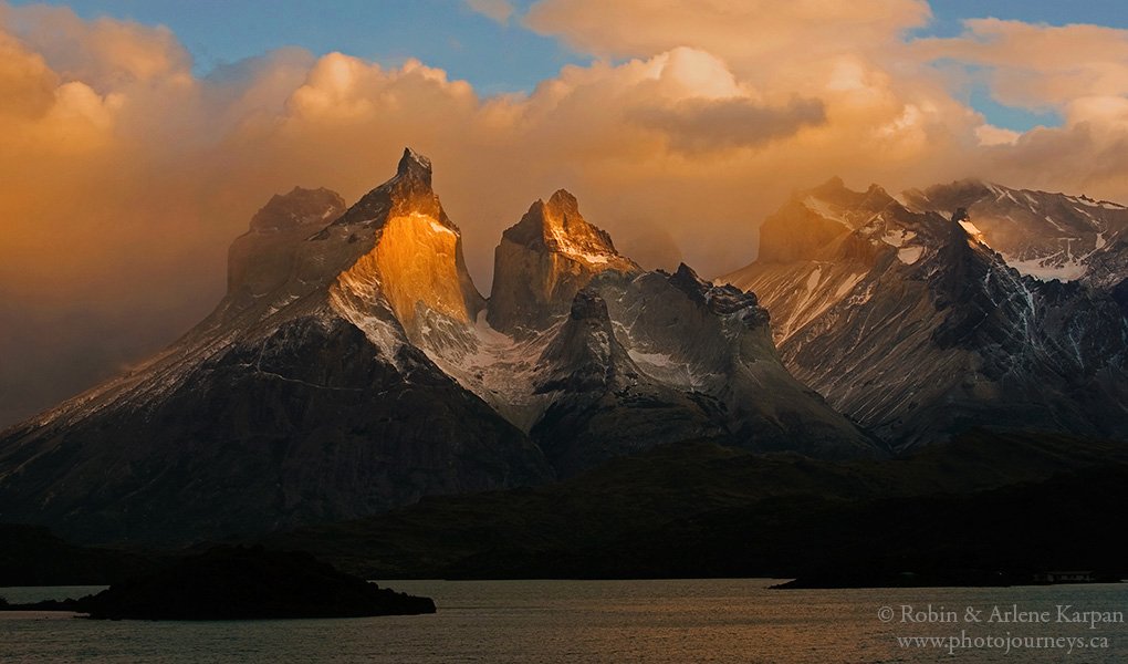 1st Place Sun breaking through the storm clouds in Torres del Paine National Park, Chile by Robin&Arlene Karpan @KarpanParkland