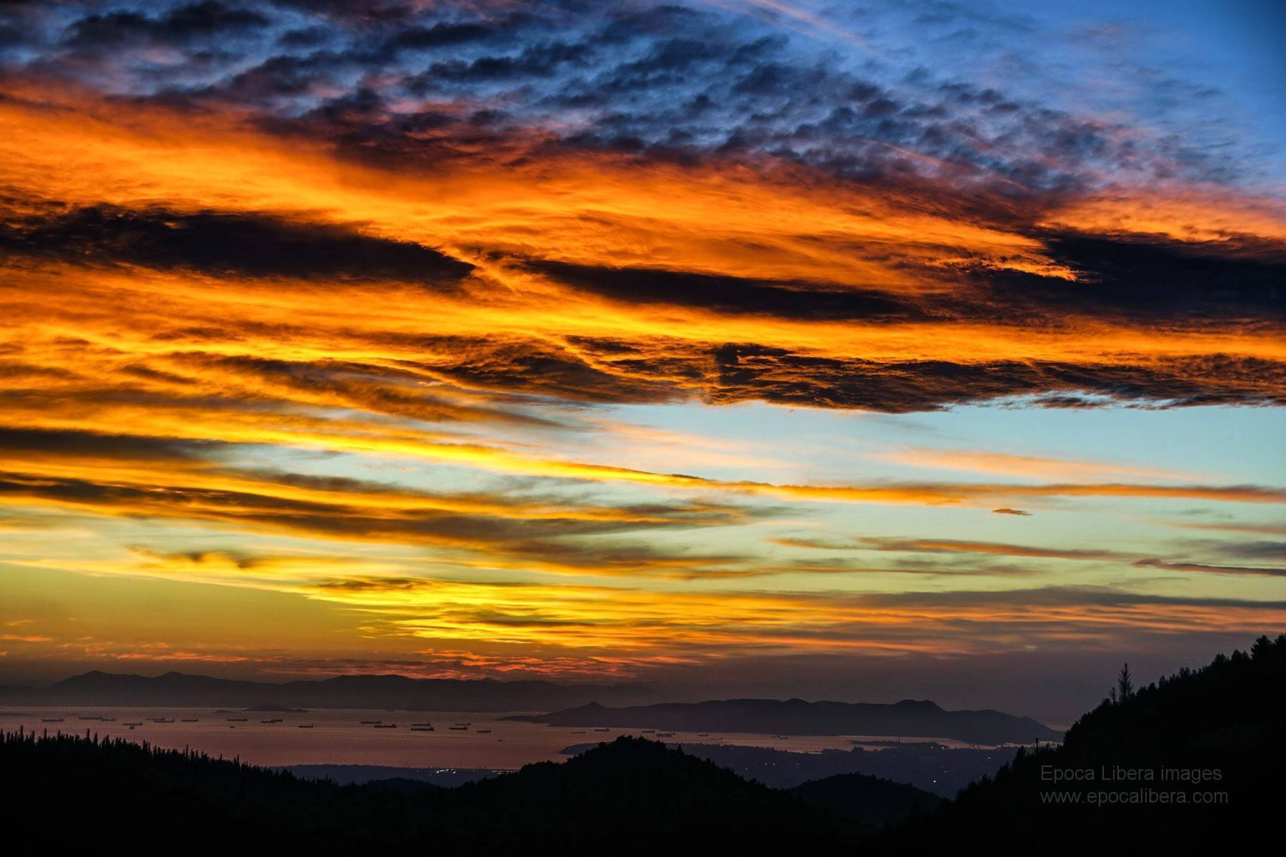 Athens and Piraeus as seen from Hymettus mountain during a majestic sunset by epoca libera @epocalibera