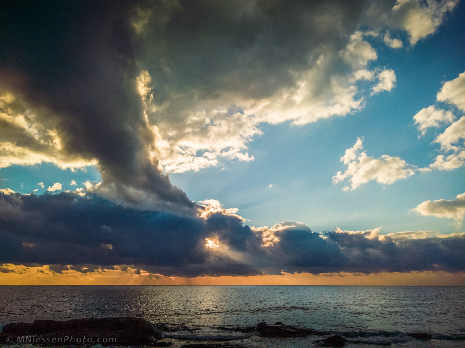 That day on the French Riviera started very well with this amazing sunrise, complete with tornado-shaped clouds and a great focused ray of light.