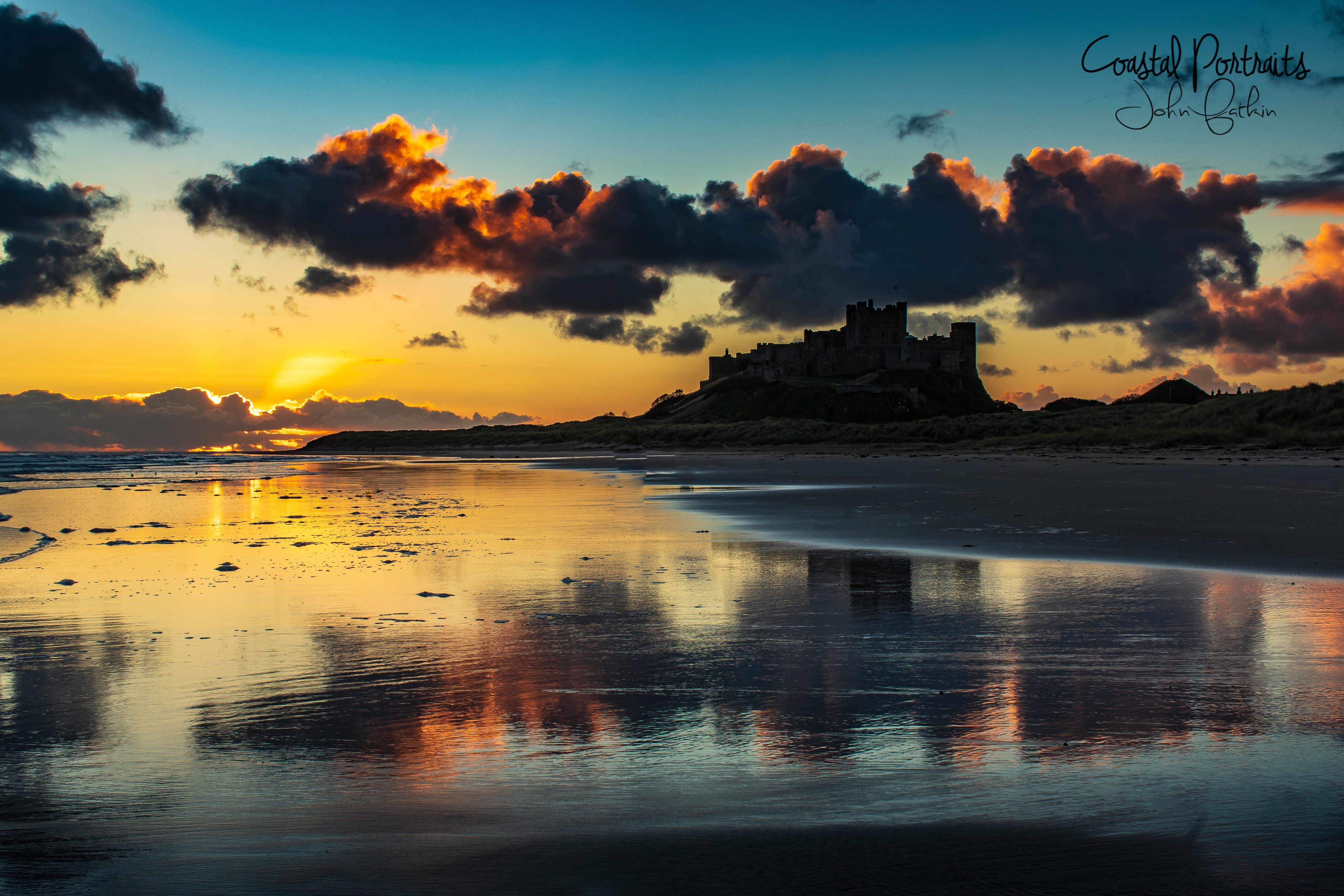 Bamburgh's Beach & famous Castle by Coastal Portraits @johndefatkin