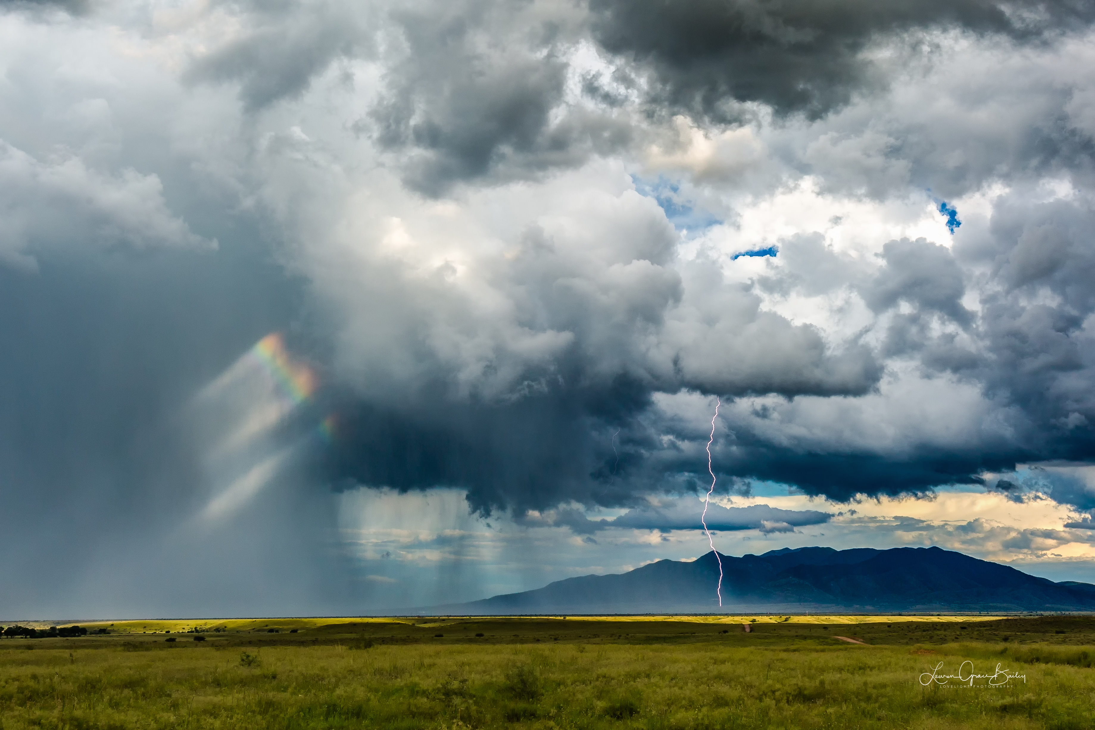 Rainbow and Lightning during storm near Elgin, Arizona by Lori Grace Bailey @lorigraceaz