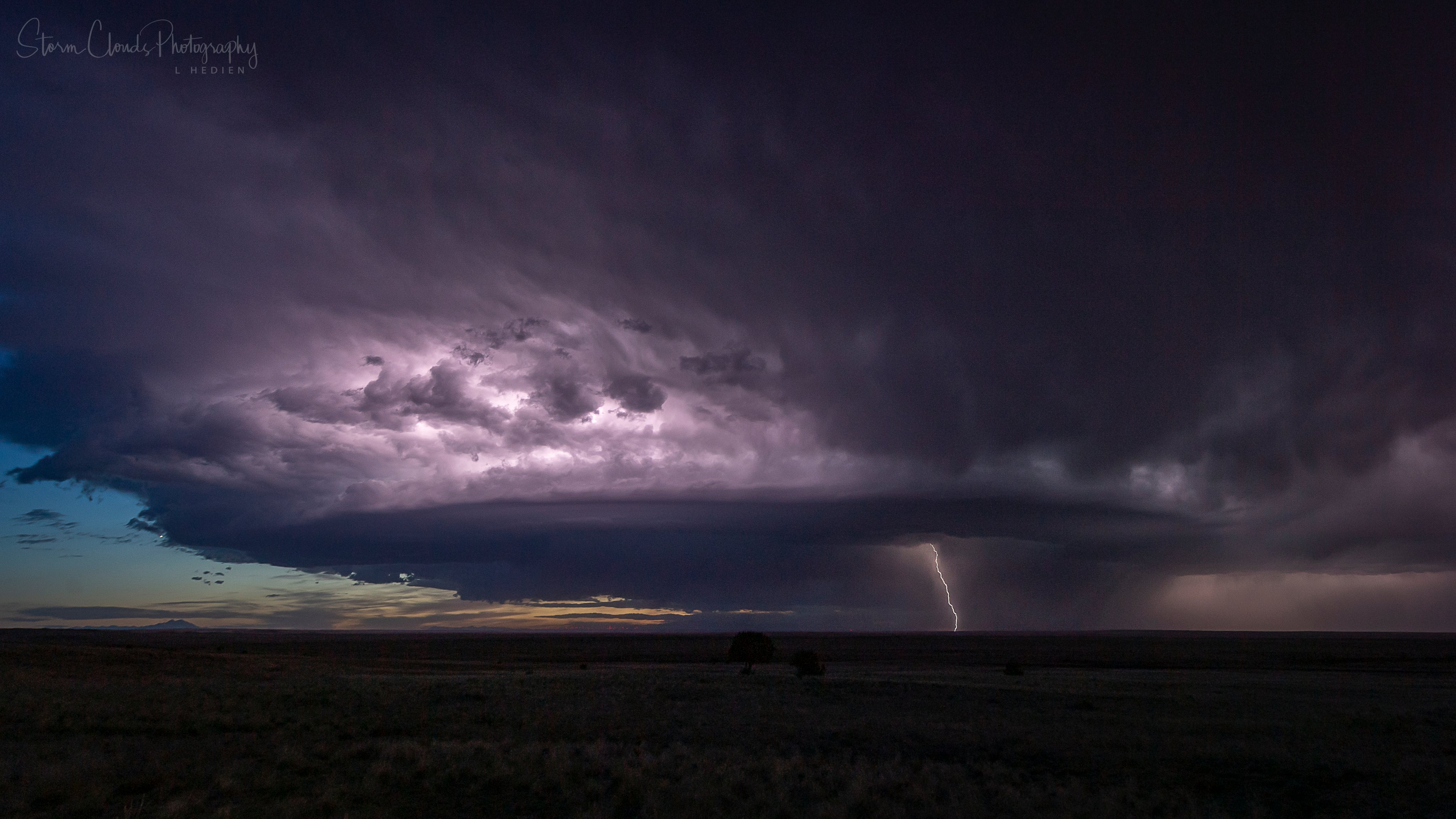 3rd Place lightning and a supercell on the Great Plains by Laura Hedien @lhedien