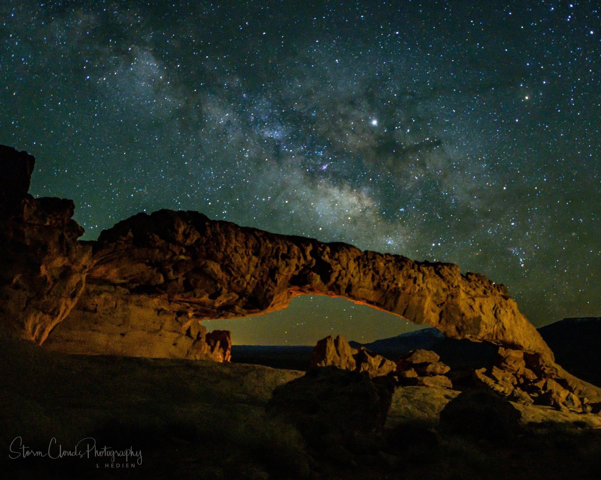 3rd Place Milky Way and one of the many arches in the southwest US by Laura Hedien @lhedien